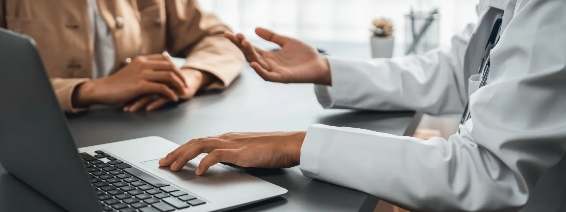 A professional person showing a report in a copassionate way to a client.